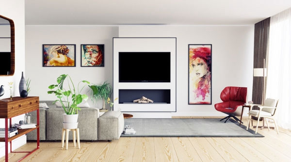 客厅电视背景墙之洁白的墙面，重点突出装饰画的颜色，这样的客厅电视背景墙很有美感
