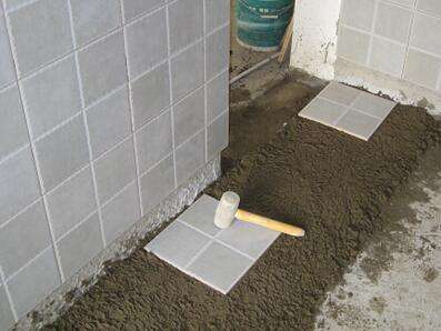 卫生间地砖是用干铺好还是湿铺好